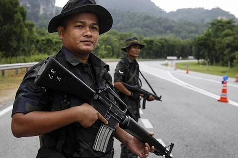 Malaysia deports eight Indonesians for carrying IS logo