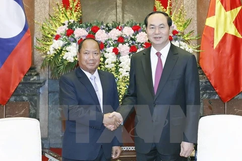 President hosts Lao Minister of Public Security 