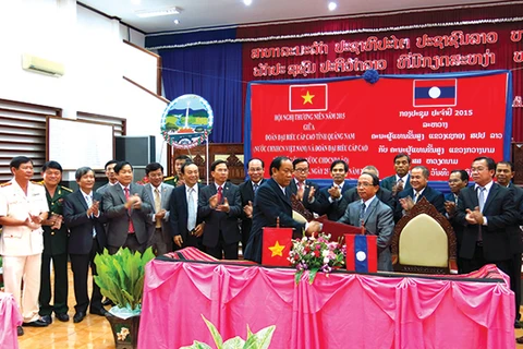 Quang Nam works with Lao province to protect forest