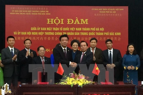 Hanoi VFF Committee boosts ties with Beijing counterpart