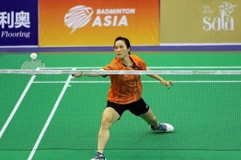 Trang enters second round of Asian badminton tourney