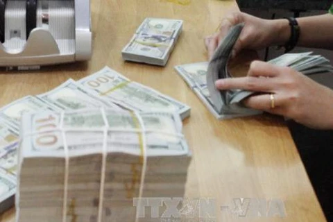 Reference exchange rate goes down 2 VND 