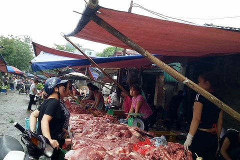 Firms promote pork demand, farmers struggle