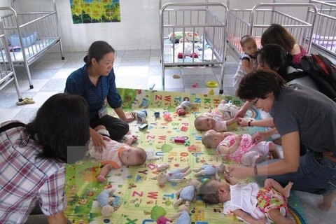 Yen Bai works to care for HIV/AIDS-affected children