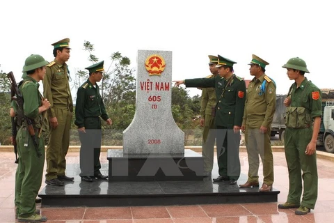 Vietnamese, Lao provinces jointly build peaceful borderline