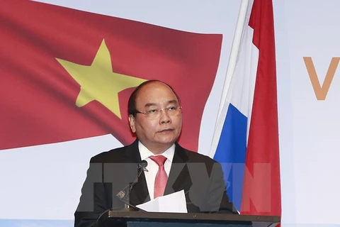 Vietnam to lift restrictions on foreign investors: PM
