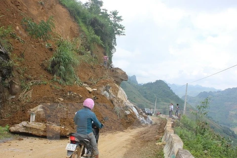 Torrential rains, landslides hit the north, killing 12 