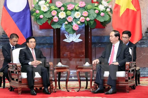 President Tran Dai Quang hails Lao Vice President’s visit