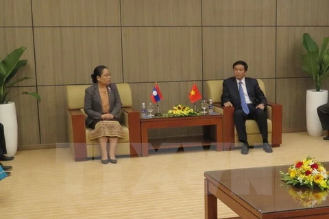 NA Offices of Vietnam, Laos tighten ties