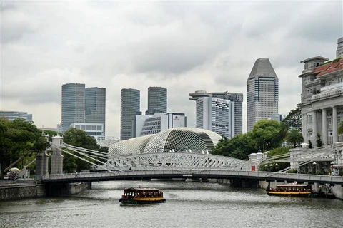Singapore revises up economic growth forecast