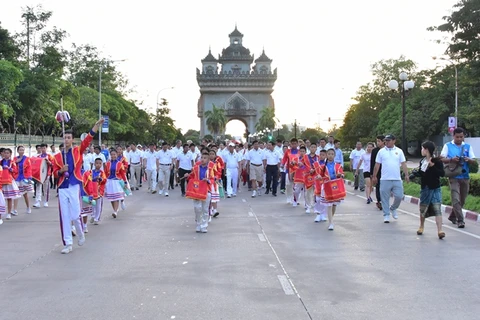Laos holds mini-marathon to celebrate 50th ASEAN anniversary