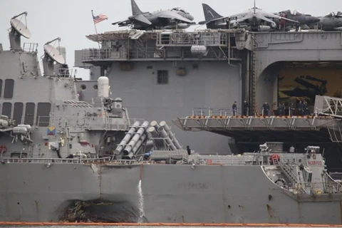 Malaysia probes collision of US destroyer