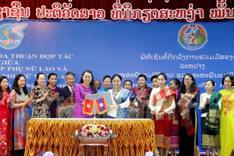 Women’s Unions of Vietnam, Laos seek to foster cooperation 