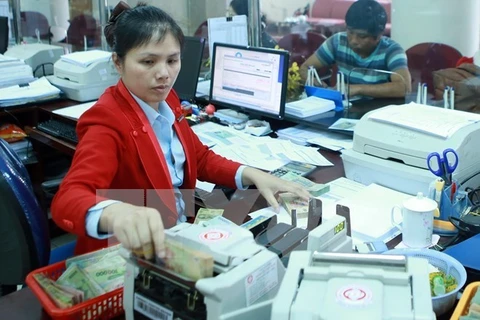 Reference exchange rate down by 2 VND at week’s beginning