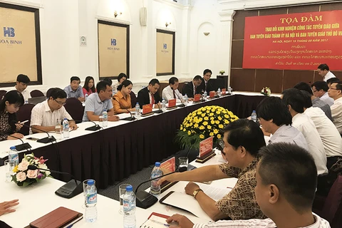 Hanoi, Vientiane share experience in propaganda work