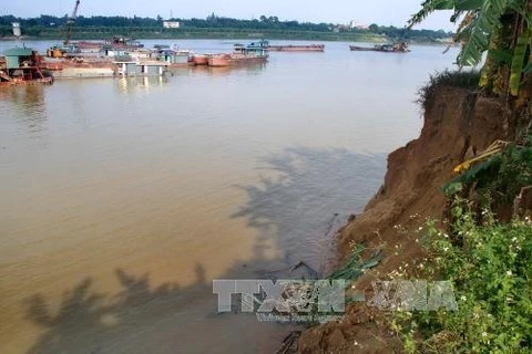 Sand mining erodes farm land in northern provinces