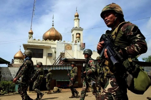 Philippine police arrest Indonesian militant in Marawi
