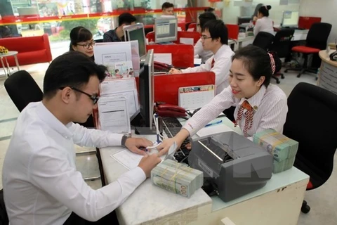 Reference exchange rate goes down by 10 VND