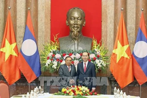 President Tran Dai Quang hails Lao leader’s visit