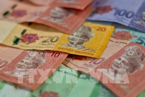 Malaysia’s ringgit hits 19-month high against USD