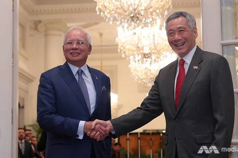 Singapore, Malaysia sign bilateral transport agreement 