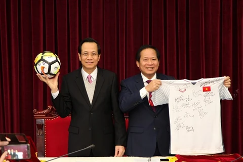 PM presents U23 team’s ball, shirt for auction to raise funds for the poor