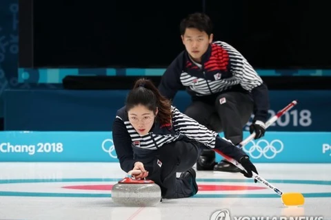 Curling, ski jumping kick off Winter Olympics 2018