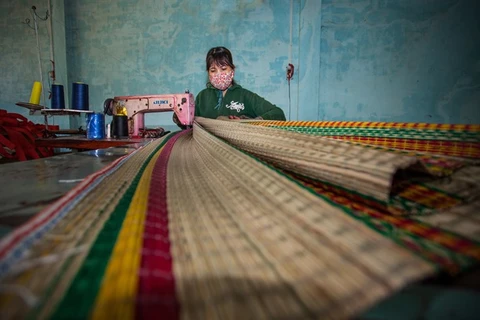 New machines revive mat weaving village