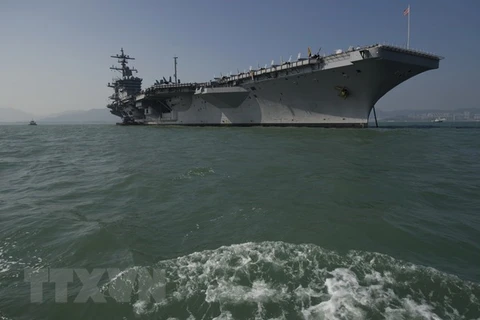 Vietnam officials visit US aircraft carrier