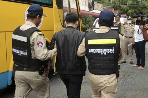 Cambodia arrests 100 Chinese suspects over telecoms fraud