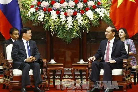 President Tran Dai Quang meets with Lao PM Thongloun Sisoulith
