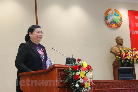 Vietnam share experiences in taking votes of confidence with Laos