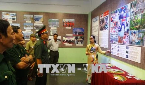Exhibition showcases efforts to revive land polluted by UXO, chemicals 