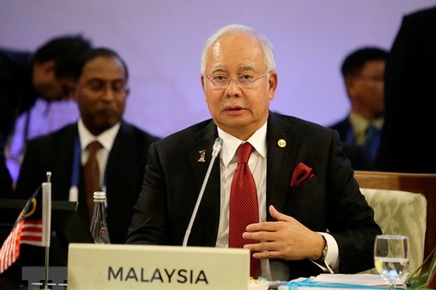 Malaysian PM vows minimum wage hike ahead of general election