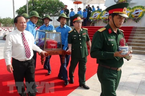 Quang Binh holds reburial service for remains of martyrs 