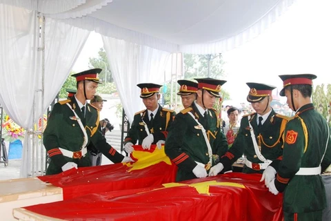 Quang Tri reburies martyrs’ remains repatriated from Laos