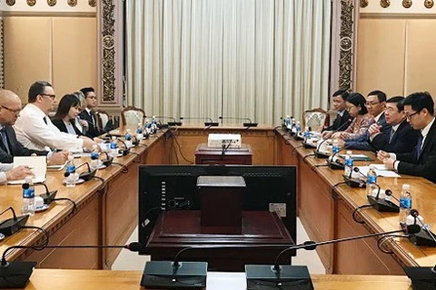 HCM City official receives international guests 