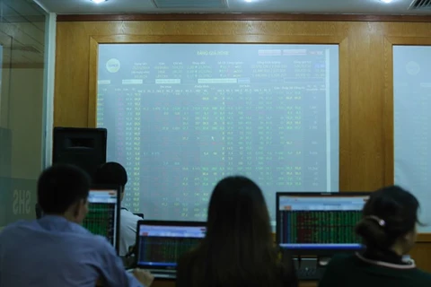 Shares bargained away, pushing down VN-Index