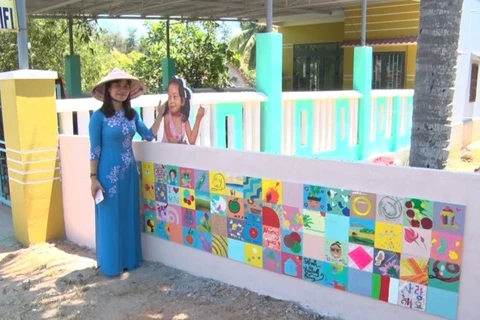 Korean painters launch 30 more murals in Quang Nam village