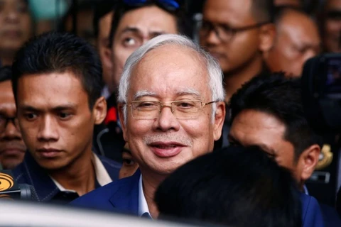 Former Malaysian PM denies wrongdoing over projects with China