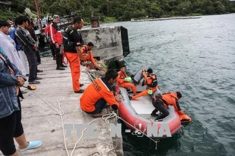 Indonesia police suspect criminal offence behind capsized boat