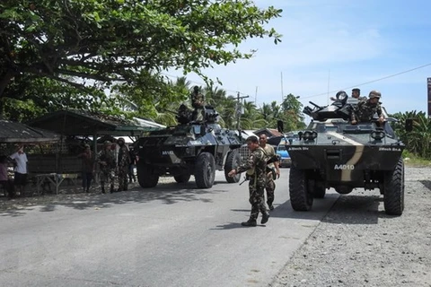 Philippines retakes southern town from pro-IS militants