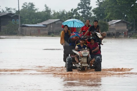 Laos temporarily bans activities in broken dam’s vicinity