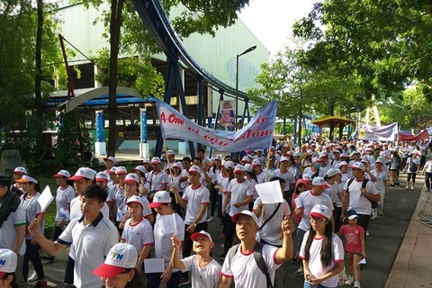 HCM City: Over 5,000 walk for AO victims, disabled 