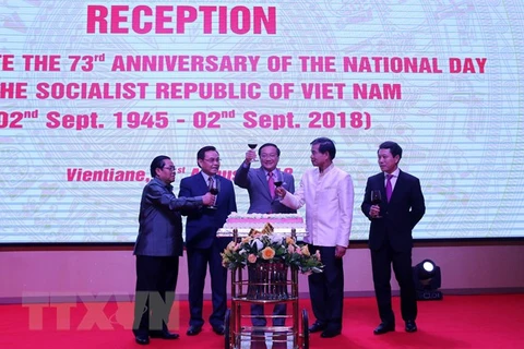 National Day marked in Laos, Mozambique