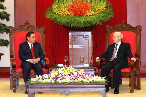 Laos vows to work with Vietnam to enhance bilateral ties