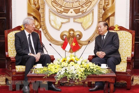 Deputy PM hosts Singaporean counterpart in Hanoi