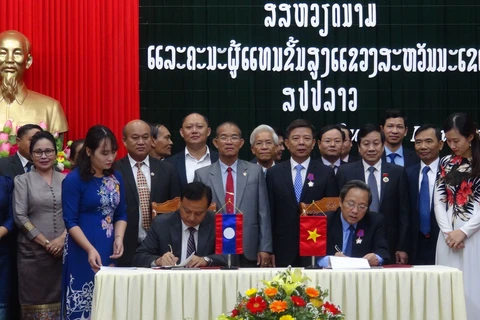 Quang Binh, Lao locality promote cooperation, exchange 