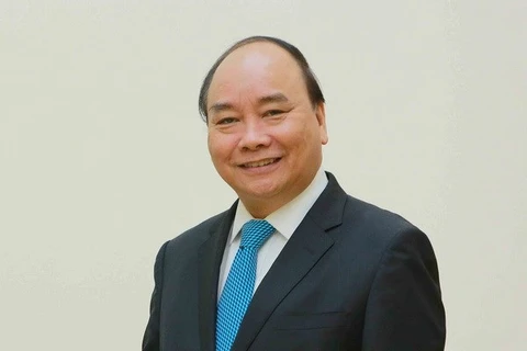 PM Nguyen Xuan Phuc leaves for China’s first international import expo