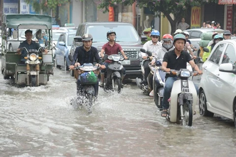 Hanoi’s water drainage system overloaded